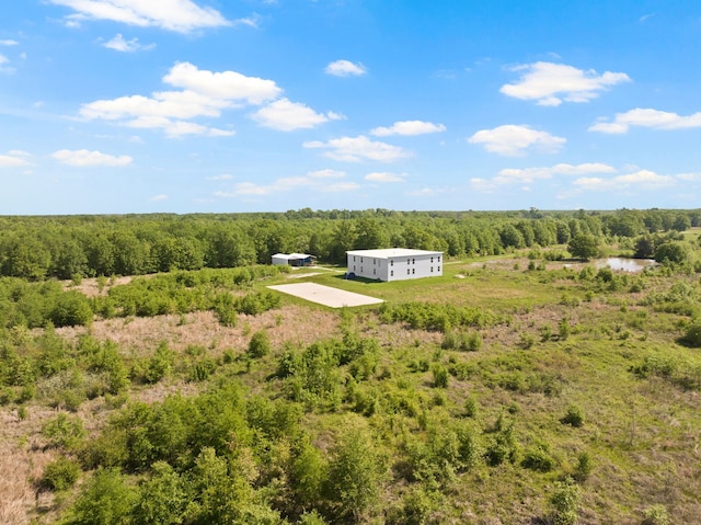 drone / aerial view with a view of trees