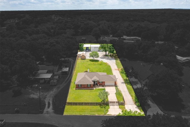 bird's eye view with a view of trees