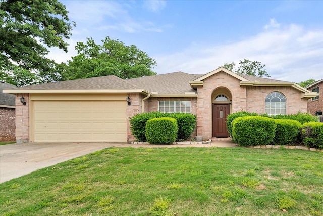 405 Londonderry Ln, Mansfield, TX 76063 - ranch-style house with roof with shingles, concrete driveway, brick siding, a front yard, and a garage