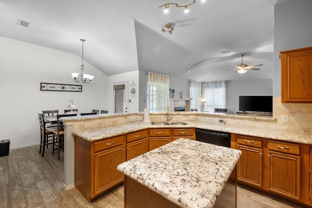 405 Londonderry Ln, Mansfield, TX 76063 - kitchen featuring a sink, vaulted ceiling, visible vents, ceiling fan with notable chandelier, and dishwasher