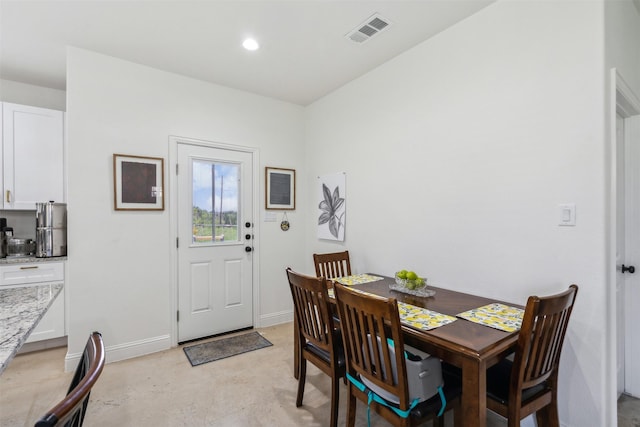 dining space featuring baseboards, visible vents, and recessed lighting