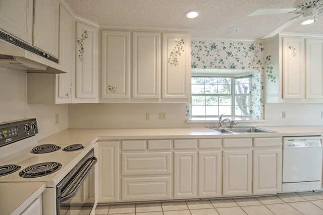 kitchen with range with electric cooktop, a textured ceiling, white dishwasher, light countertops, and under cabinet range hood