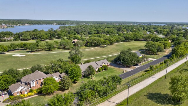 drone / aerial view featuring a water view and golf course view