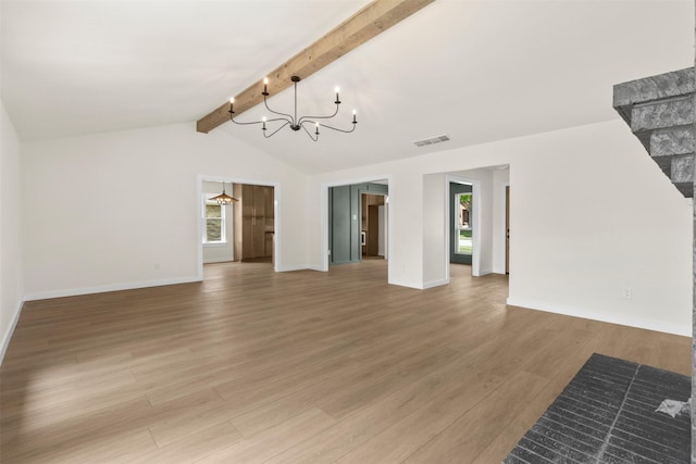 4524 Boston Dr, Plano, TX 75093 - unfurnished living room with an inviting chandelier, visible vents, baseboards, vaulted ceiling with beams, and light wood finished floors