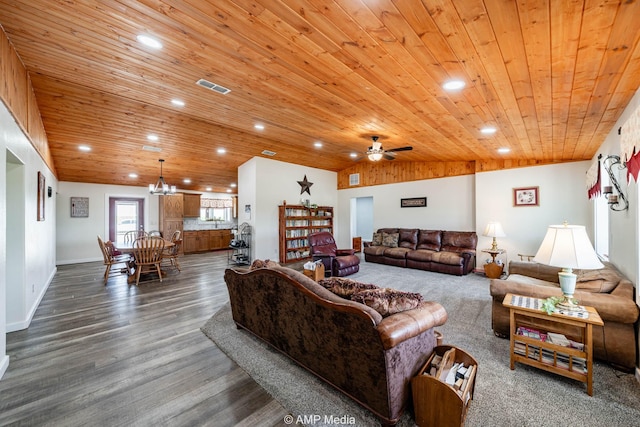 3734 Fm 600 S, Anson, TX 79501 - living area featuring ceiling fan with notable chandelier, wood ceiling, visible vents, dark wood-style floors, and recessed lighting