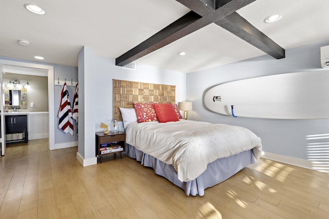 bedroom with baseboards, beamed ceiling, and recessed lighting