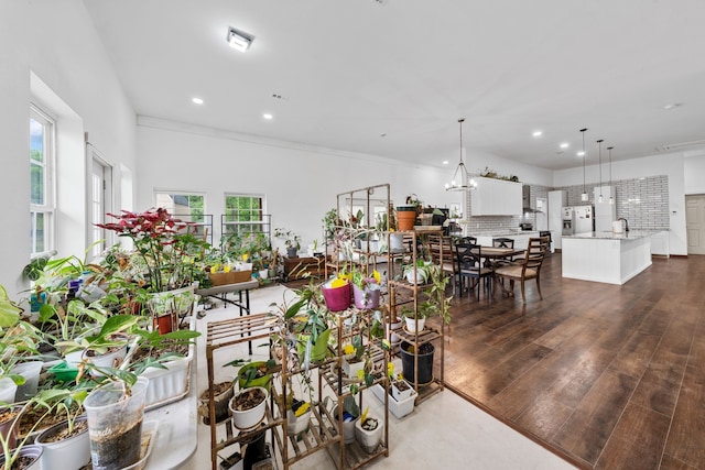 interior space featuring recessed lighting and dark wood-style floors
