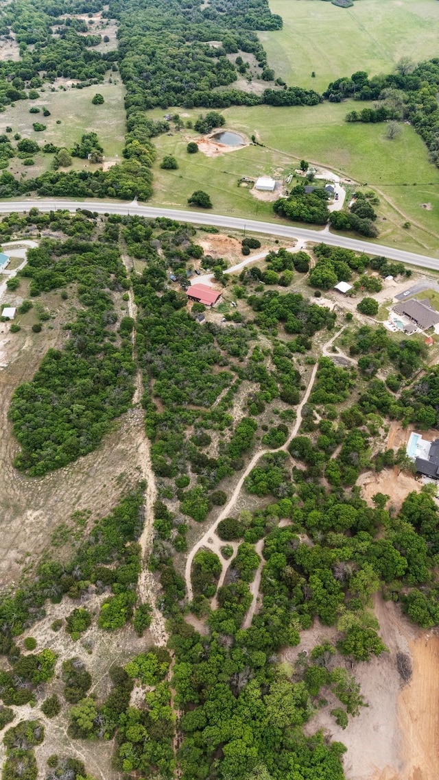 birds eye view of property featuring a rural view