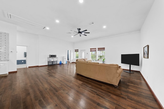 living room featuring attic access, ceiling fan, visible vents, and recessed lighting