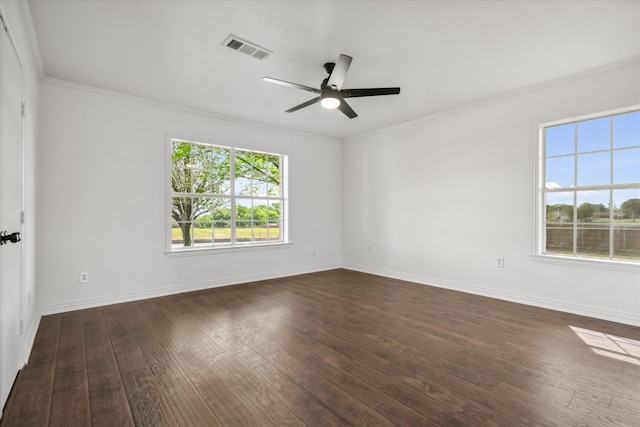 1631 E Farmers, Seagoville, TX 75159 - empty room with ceiling fan, dark wood finished floors, baseboards, ornamental molding, and visible vents