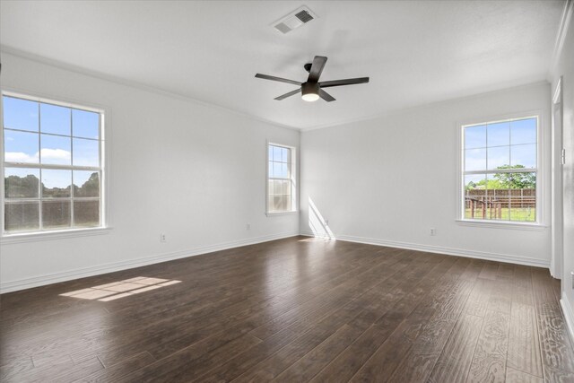 1631 E Farmers, Seagoville, TX 75159 - empty room with plenty of natural light, visible vents, ceiling fan, and dark wood finished floors