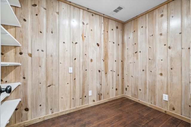 1631 E Farmers, Seagoville, TX 75159 - empty room featuring hardwood / wood-style floors, visible vents, and wood walls