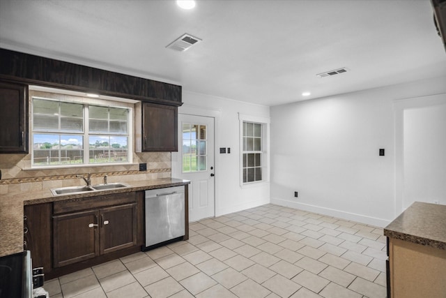 1631 E Farmers, Seagoville, TX 75159 - kitchen featuring backsplash, dishwasher, visible vents, and a sink
