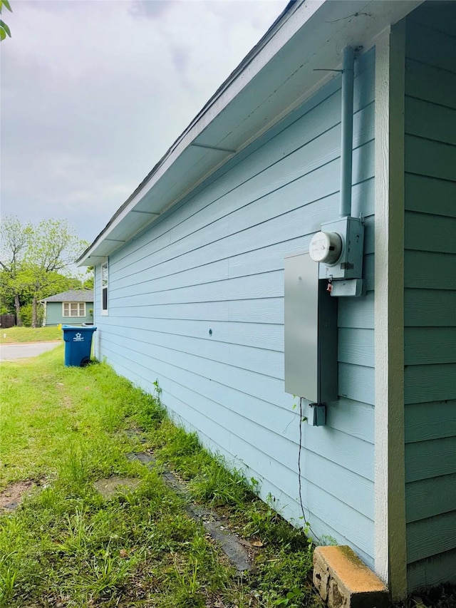 view of home's exterior featuring a yard