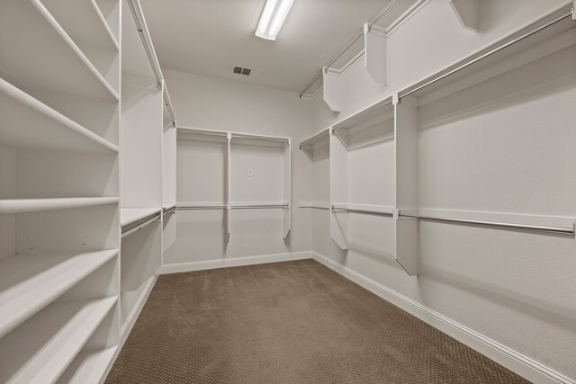 1001 Broadmoor Way, Roanoke, TX 76262 - spacious closet featuring visible vents and carpet flooring