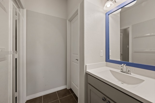 1001 Broadmoor Way, Roanoke, TX 76262 - bathroom featuring baseboards, tile patterned flooring, and vanity