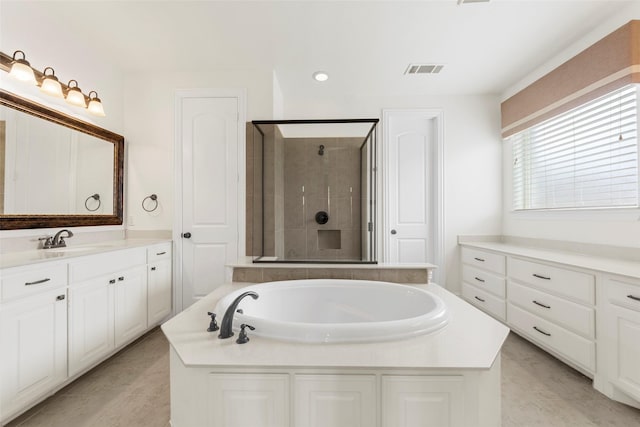 944 Abbott Ln, Allen, TX 75013 - bathroom featuring a stall shower, vanity, a bath, and recessed lighting