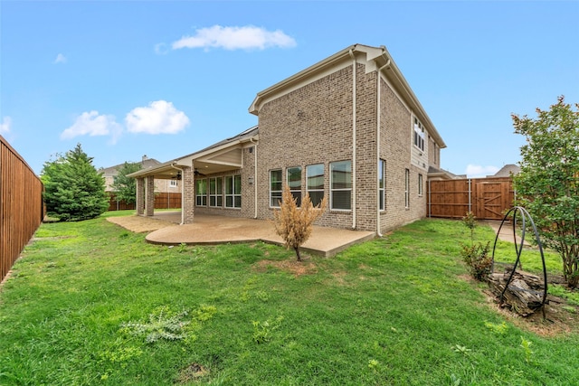 944 Abbott Ln, Allen, TX 75013 - rear view of property with a patio, a gate, and brick siding
