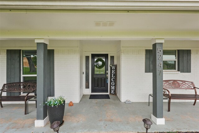 5247 Fm 1569, Farmersville, TX 75442 - view of front facade featuring stucco siding, a front yard, and metal roof