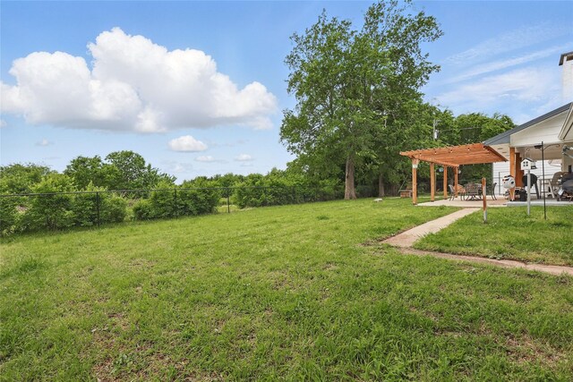 5247 Fm 1569, Farmersville, TX 75442 - back of property with a standing seam roof, covered porch, a lawn, and metal roof