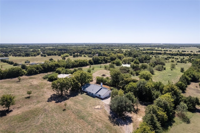 birds eye view of property featuring a rural view