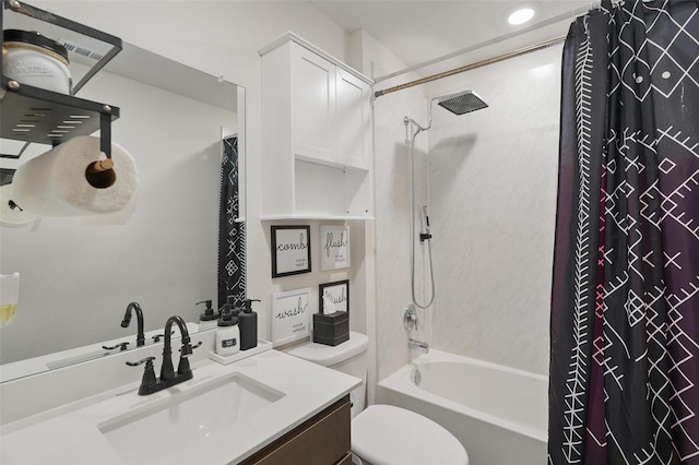 bathroom with shower / tub combo, toilet, and vanity