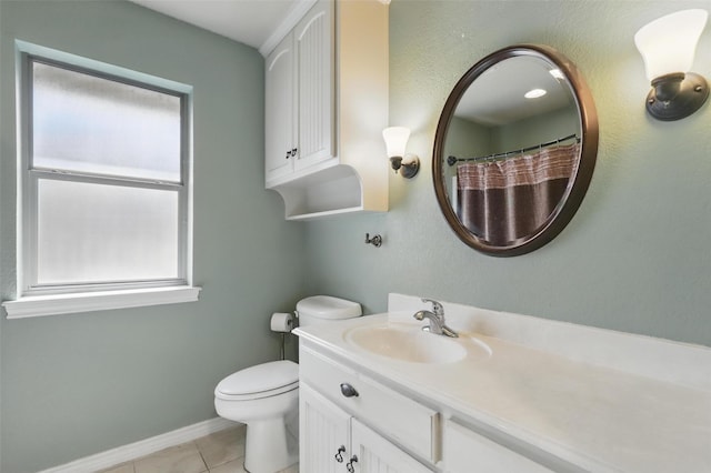 1220 Chaparral Ln, Granbury, TX 76048 - full bathroom featuring tile patterned floors, baseboards, vanity, and toilet