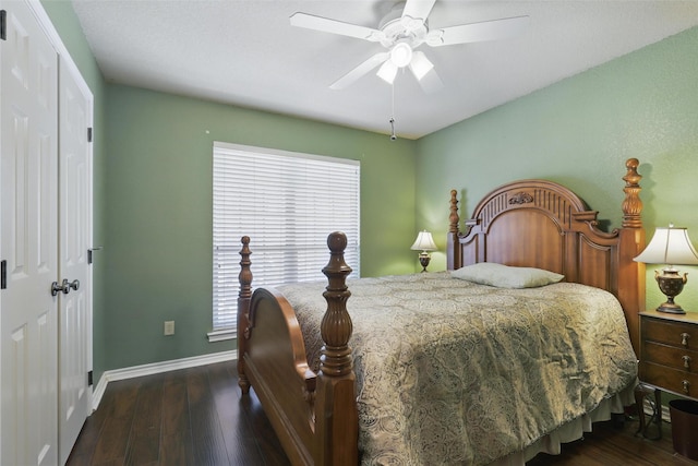 1220 Chaparral Ln, Granbury, TX 76048 - bedroom featuring baseboards, dark wood-style flooring, and multiple windows