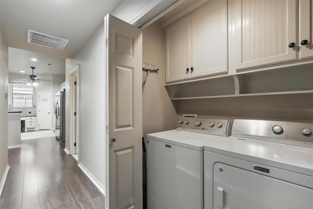 1220 Chaparral Ln, Granbury, TX 76048 - washroom with wood finished floors, visible vents, baseboards, separate washer and dryer, and ceiling fan