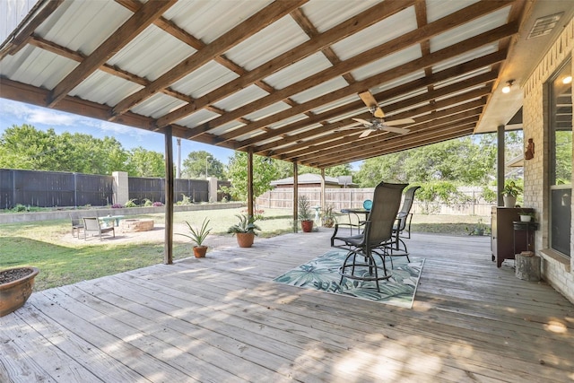 1220 Chaparral Ln, Granbury, TX 76048 - wooden terrace with a fire pit, a lawn, and a fenced backyard
