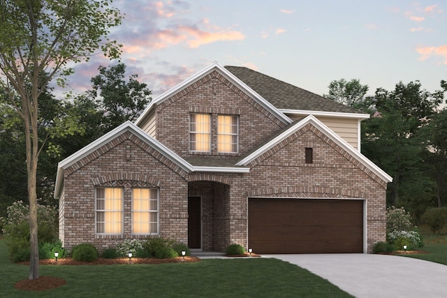 view of front of property featuring roof with shingles, driveway, brick siding, an attached garage, and a front yard