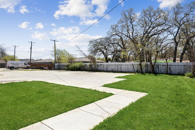 view of yard featuring fence