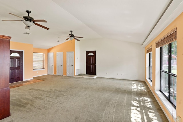 156 King Arthur Rd, Mabank, TX 75156 - unfurnished living room featuring ceiling fan, vaulted ceiling, carpet floors, and baseboards