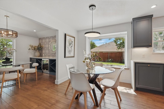 dining space featuring light wood finished floors and a wealth of natural light