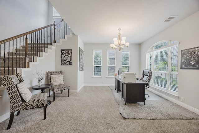 dining room featuring visible vents, carpet, baseboards, and a notable chandelier