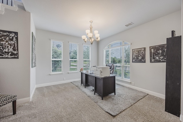 office space with visible vents, a wealth of natural light, and carpet
