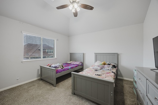 bedroom featuring light colored carpet, a ceiling fan, baseboards, and lofted ceiling