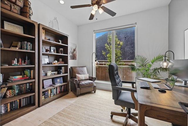 office featuring a ceiling fan, recessed lighting, and wood finished floors