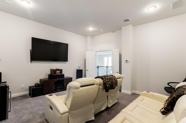 living room featuring baseboards, dark colored carpet, visible vents, and recessed lighting