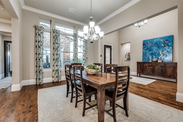 2500 Greenspoint Ln, Prosper, TX 75078 - dining space with a chandelier, wood finished floors, ornamental molding, and baseboards