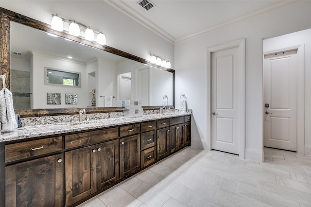 2500 Greenspoint Ln, Prosper, TX 75078 - full bathroom with crown molding, double vanity, baseboards, and tile patterned flooring