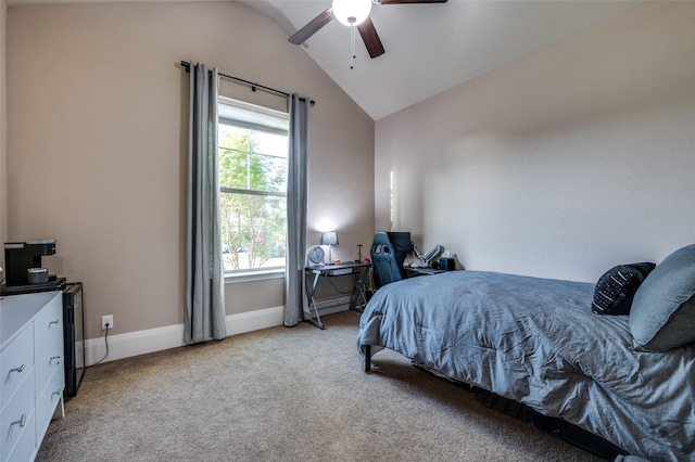 bedroom featuring lofted ceiling, a ceiling fan, baseboards, and light colored carpet