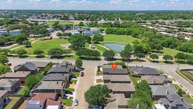 bird's eye view with a water view and a residential view