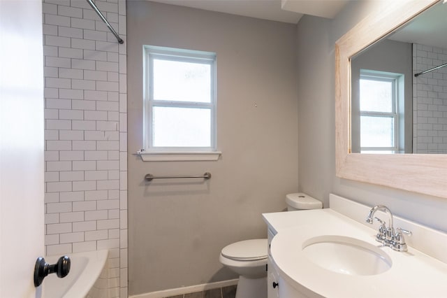 1904 Park Hill Dr, Arlington, TX 76012 - full bath featuring toilet, vanity, and washtub / shower combination