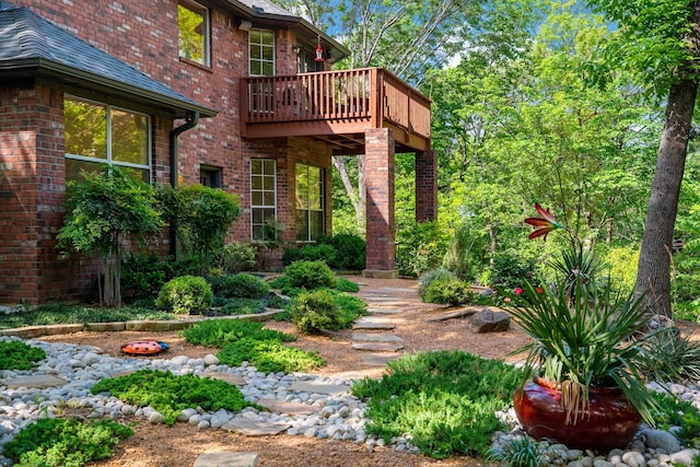 view of yard featuring a wooden deck