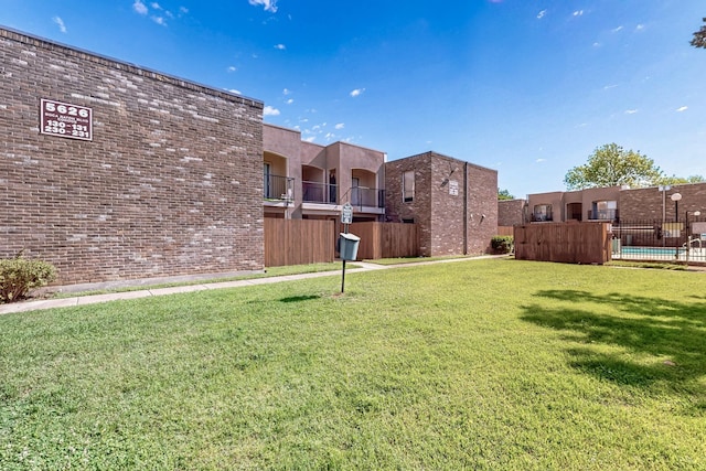 view of yard with fence