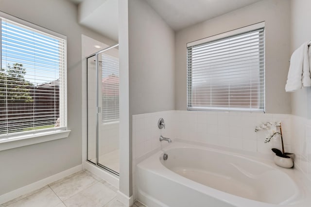 1008 Shire Dr, Aubrey, TX 76227 - bathroom featuring tile patterned flooring, a wealth of natural light, a shower stall, and a bath