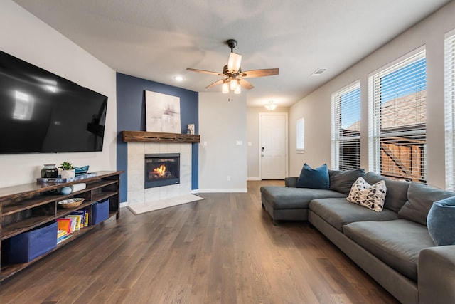 1008 Shire Dr, Aubrey, TX 76227 - living area featuring recessed lighting, a fireplace, dark wood-style flooring, a ceiling fan, and baseboards