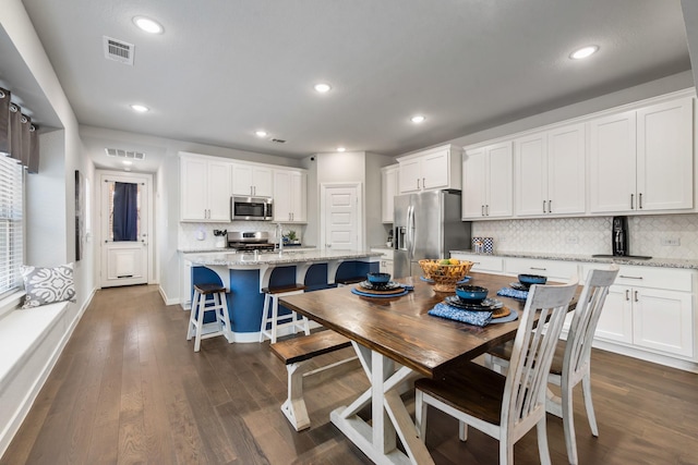 1008 Shire Dr, Aubrey, TX 76227 - dining space with recessed lighting, visible vents, and dark wood-style floors