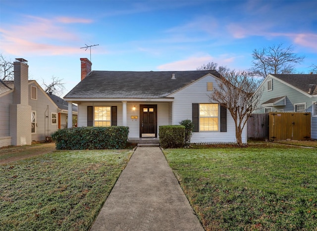 4209 Curzon Ave, Fort Worth, TX 76107 - bungalow-style house featuring a yard, covered porch, and fence